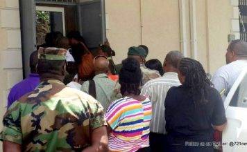 Five police officers charged with murder