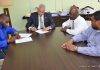 Prime Minister Gumbs signs for Middle Region sewage connections