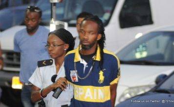 Three arrested for death threat