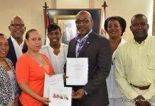 Minister TEATT Connor Signs-off on Chamber of Commerce & Industry Rules of Procedure.