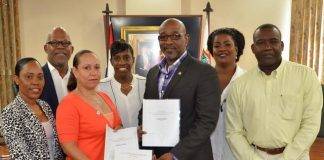 Minister TEATT Connor Signs-off on Chamber of Commerce & Industry Rules of Procedure.