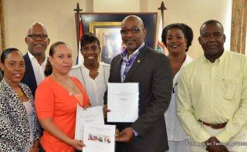 Minister TEATT Connor Signs-off on Chamber of Commerce & Industry Rules of Procedure.