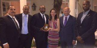 Minister TEATT Connor presents Kingdom Consul General in Miami with Token of Appreciation during Trade Mission