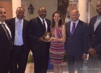 Minister TEATT Connor presents Kingdom Consul General in Miami with Token of Appreciation during Trade Mission