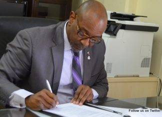 NA: Minister commits fraud by presenting adjusted security contract