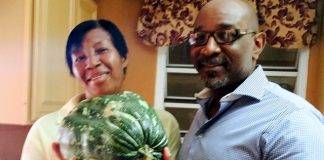 Minister Connor presents School Garden Pumpkin to I-CAN Foster Home