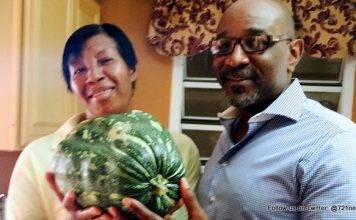 Minister Connor presents School Garden Pumpkin to I-CAN Foster Home