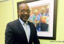 Minister Connor meets with six-year old Giomari Hodge who wanted to discuss national issues