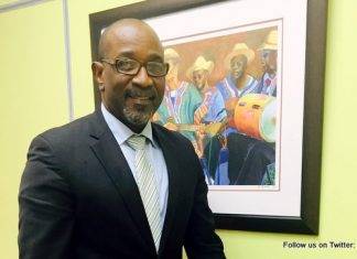 Minister Connor meets with six-year old Giomari Hodge who wanted to discuss national issues