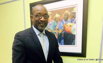 Minister Connor meets with six-year old Giomari Hodge who wanted to discuss national issues