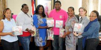 Acting Minister of Health Bourne-Gumbs provided SCDF with ear plugs to protect hearing of children in parades