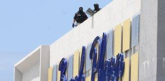 Robbery was reported to be in progress at the Beach Plaza Casino.