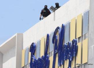 Robbery was reported to be in progress at the Beach Plaza Casino.