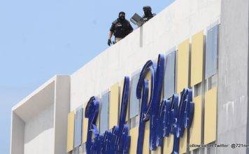 Robbery was reported to be in progress at the Beach Plaza Casino.