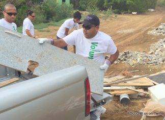 Nagico Volunteers Assist with Clean-up of Mangroves, Illegally Dumped Material at Belair Pond
