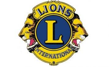 Drinking age limit signs put in Carnival Village booths by Lions Club