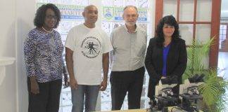 AUIS presented two microscopes to Charlotte Brookson Academy
