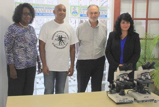AUIS presented two microscopes to Charlotte Brookson Academy