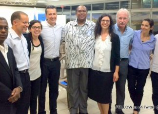 St. Martin’s Lasana Sekou speaks on racist images in Caribbean tourism promotion at Costa Rica’s International Symposium