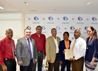 PJIA receives Aerodrome Certificate from Minister Arrindell