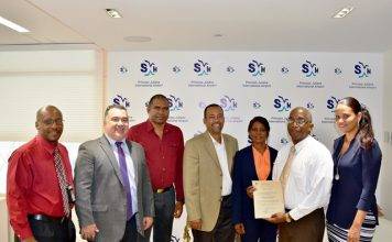 PJIA receives Aerodrome Certificate from Minister Arrindell