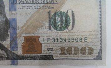 Denuncian billetes falsos de $100 de dólares en circulación