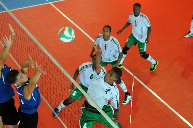 Faywani Foye of Dominica spikes against Bermuda_ 0