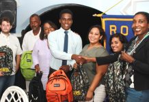 Rotary Club presents school bags with supplies to Ki-mani