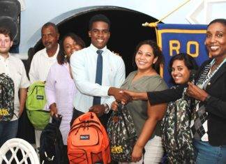Rotary Club presents school bags with supplies to Ki-mani