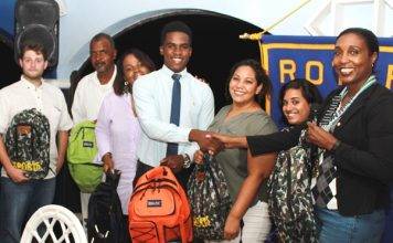 Rotary Club presents school bags with supplies to Ki-mani