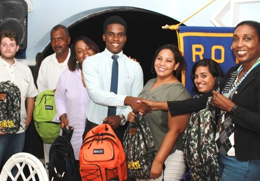 Rotary Club presents school bags with supplies to Ki-mani
