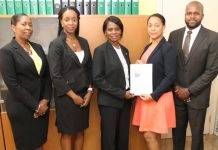 Bureau for Intellectual Property Sint Maarten officially presents Financial Statement 2014 to the Minister of TEATT