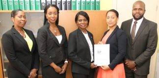 Bureau for Intellectual Property Sint Maarten officially presents Financial Statement 2014 to the Minister of TEATT