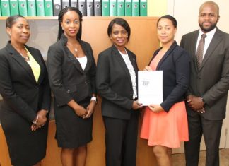 Bureau for Intellectual Property Sint Maarten officially presents Financial Statement 2014 to the Minister of TEATT