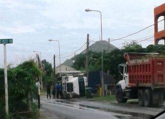 20 foot trailer toppled over on LB Scott road