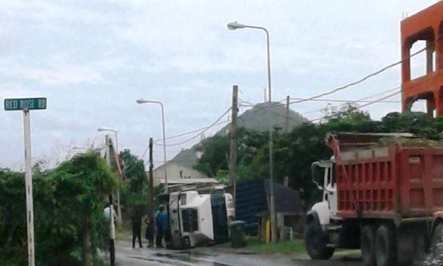 20 foot trailer toppled over on LB Scott road