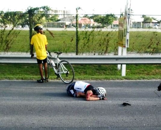 *** BREAKING NEWS ***: Cyclist fighting for his life as he was knocked down on airport road