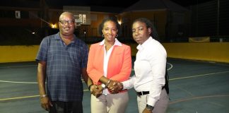 Minister Jacobs repairs lights at local basketball courts