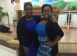 Ariella Bussue receives assistance from MP Marlin-Romeo Give Back to the Community Program