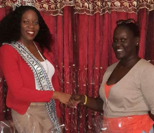 Miss Mature presents food hampers to Rotaract