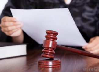 Envían a prisión a joven hallado en posesión de un arsenal de armas