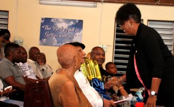 Minister Jacobs congratulates Mr. York on 100th birthday