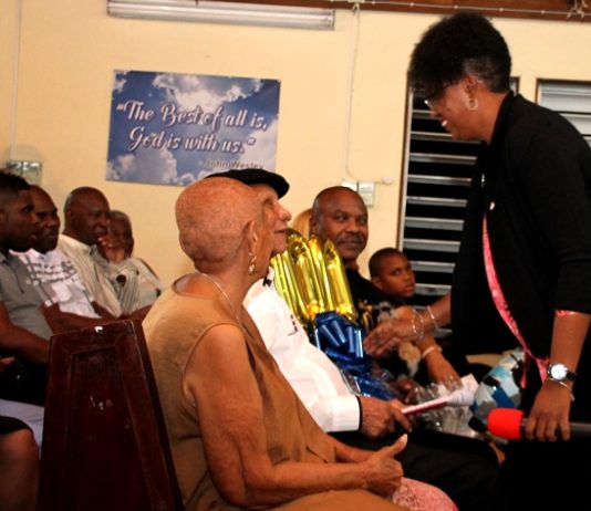 Minister Jacobs congratulates Mr. York on 100th birthday