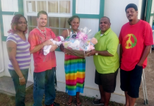 Commissioner Wilson presented a gift basket to Julissa Hassell