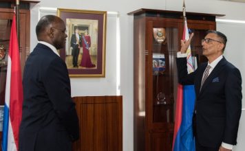 Governor Holiday swears in last new Member of Parliament