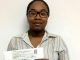 Michelene Warner receives donation to help her mother in her battle with cancer