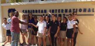 Mid Isle donate items collected by CIA Interact Club