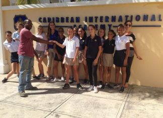 Mid Isle donate items collected by CIA Interact Club