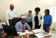 Minister Emmanuel finalizes agreement with Mildrum Road reps