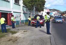 Police cadets hold traffic controls